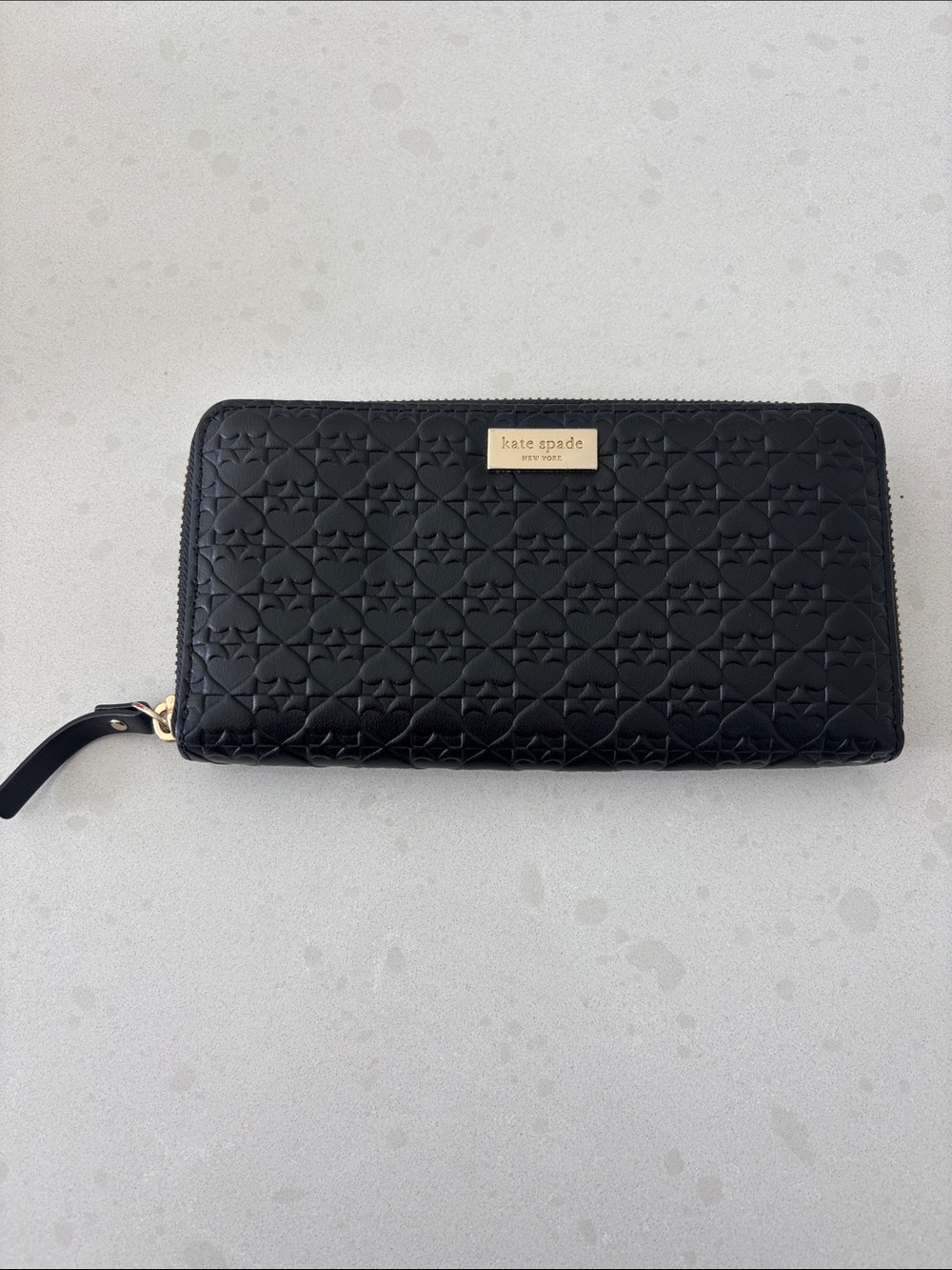 kate spade Black Quilted Zip-Around Wallet with Gold Plaque